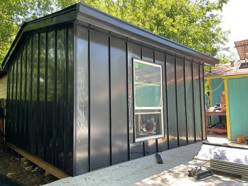 Black standing seam metal wall panels for Metal Roof Installation in Owego