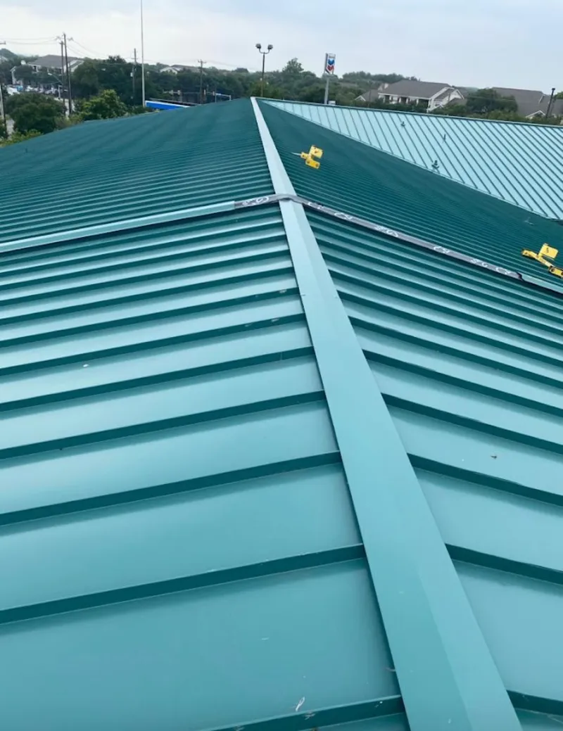Green commercial metal roof ridge and valley for Metal Roof Repair in Owego