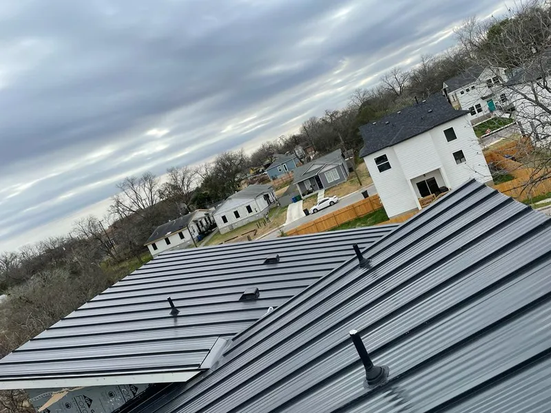 Standing seam metal roof panels with vents for Skylight Repair in Owego